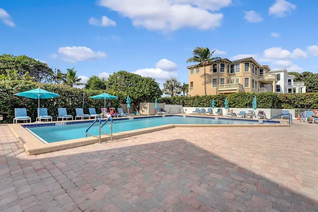 a view of a building with a swimming pool