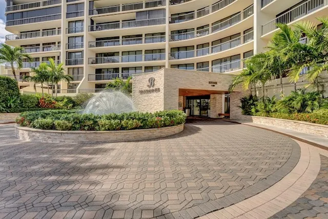 a view of a garden with a fountain