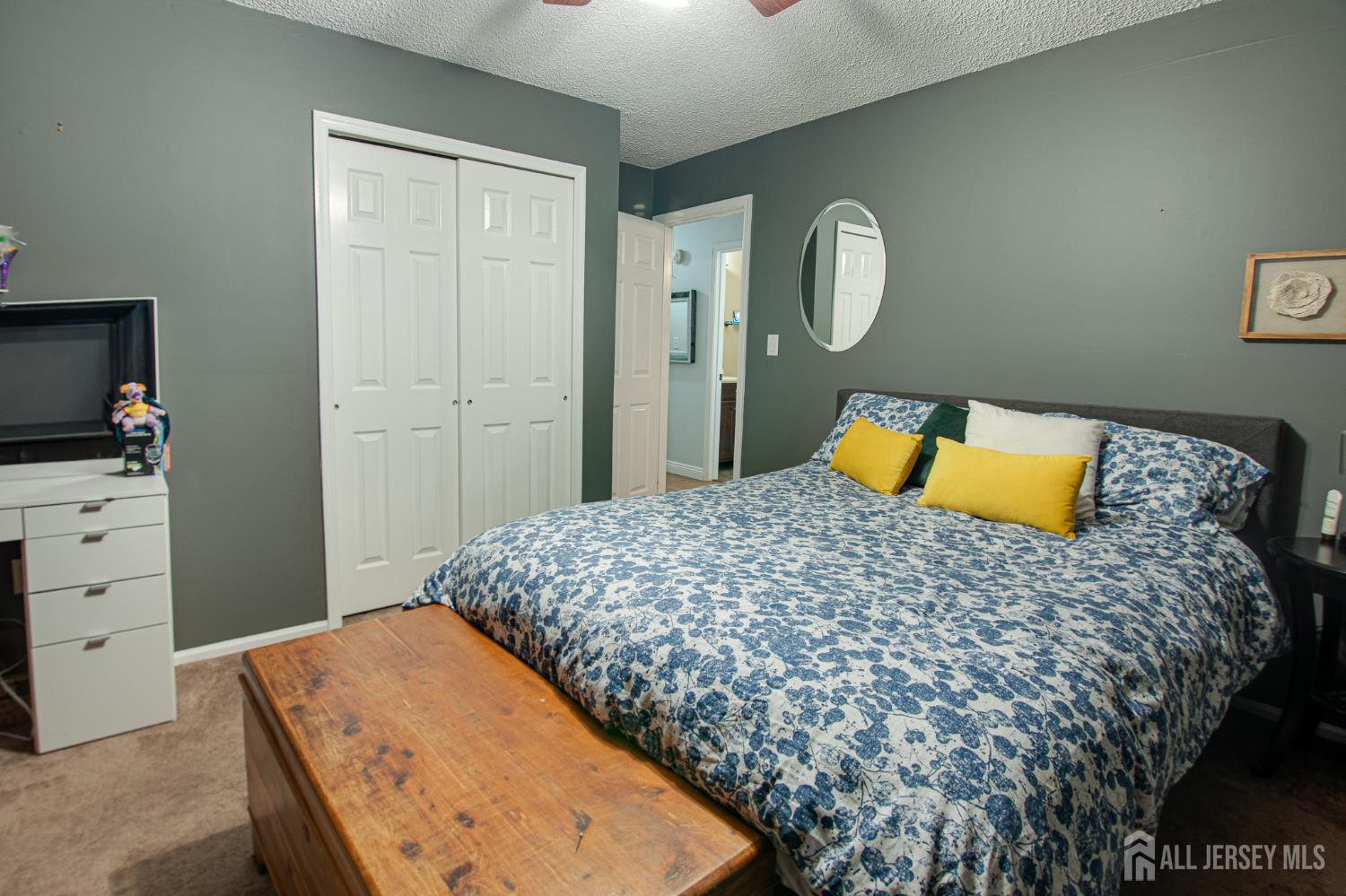 2 Fieldcrest Way Freehold, NJ 07728 - Photo 15 of 24 a bedroom with a bed and dresser