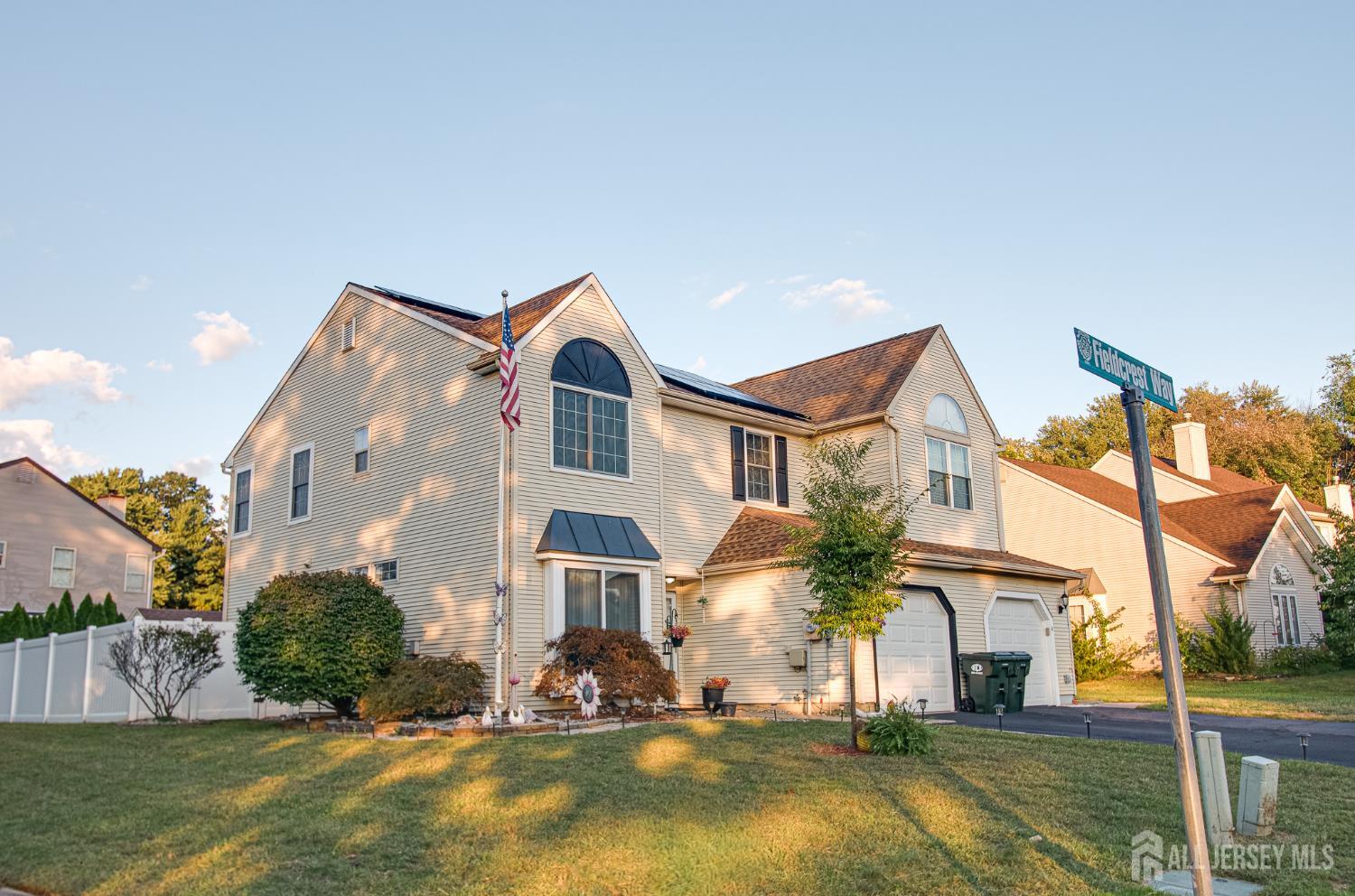 2 Fieldcrest Way Freehold, NJ 07728 - Photo 4 of 24 a front view of house with yard and swimming pool