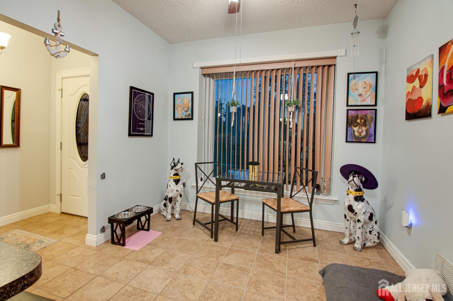 2 Fieldcrest Way Freehold, NJ 07728 - Photo 5 of 24 a bedroom with furniture and a window