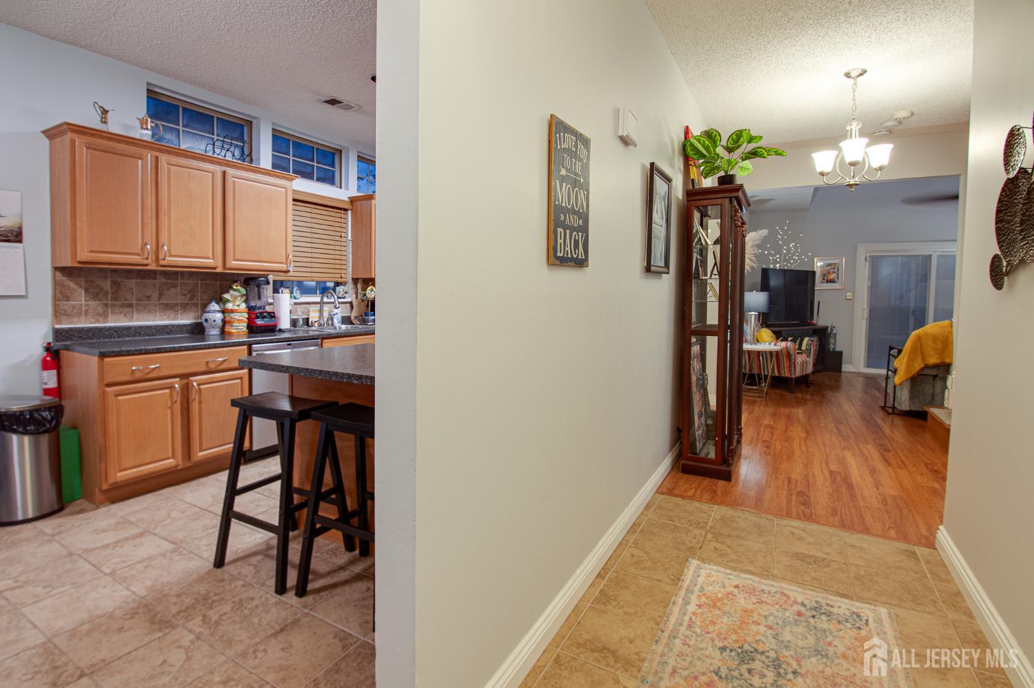 2 Fieldcrest Way Freehold, NJ 07728 - Photo 6 of 24 a view of a kitchen from the hallway