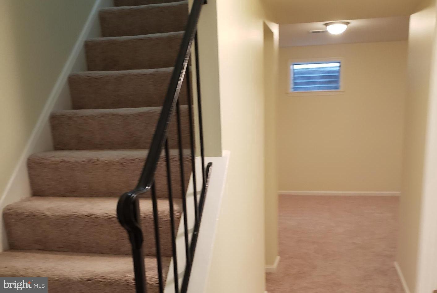 3812 Tremayne Terrace, Unit 22 Silver Spring, MD 20906 - Photo 20 of 28 View Of Stairs Leading to Main Level & View of R.R