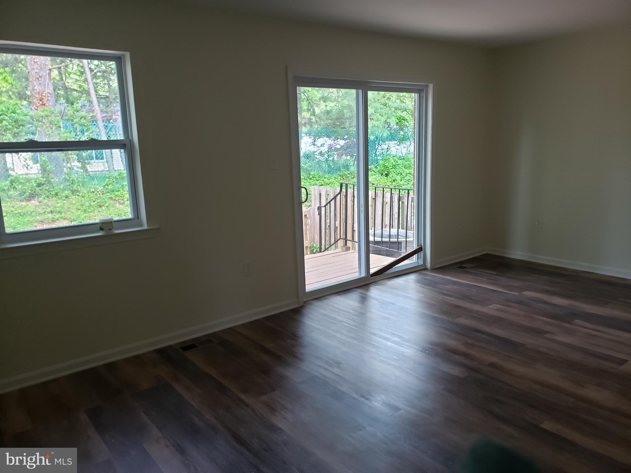 3812 Tremayne Terrace, Unit 22 Silver Spring, MD 20906 - Photo 5 of 28 Living Room Overlooking Deck & Rear