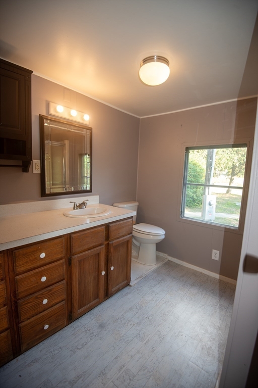 20 Dana Road Barre, MA 01005 - Photo 30 of 38 a bathroom with a double vanity sink a toilet and a mirror