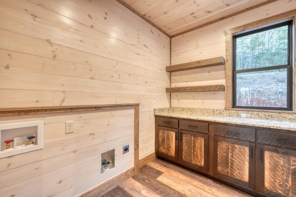 250 Wolfcreek Road Mineral Bluff, GA 30559 - Photo 18 of 59 a bathroom with a sink and a bathtub