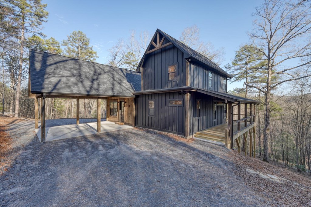 250 Wolfcreek Road Mineral Bluff, GA 30559 - Photo 2 of 59 a view of a house with wooden fence