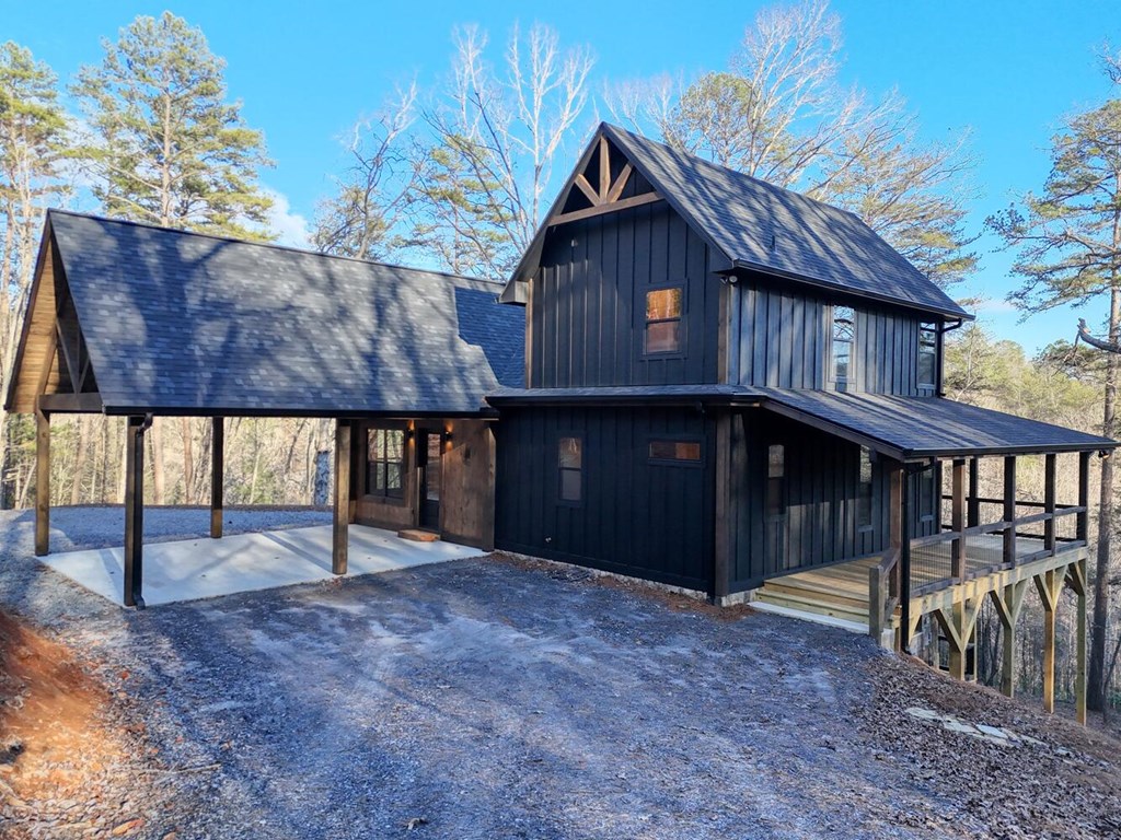 250 Wolfcreek Road Mineral Bluff, GA 30559 - Photo 24 of 59 a view of a house with wooden fence