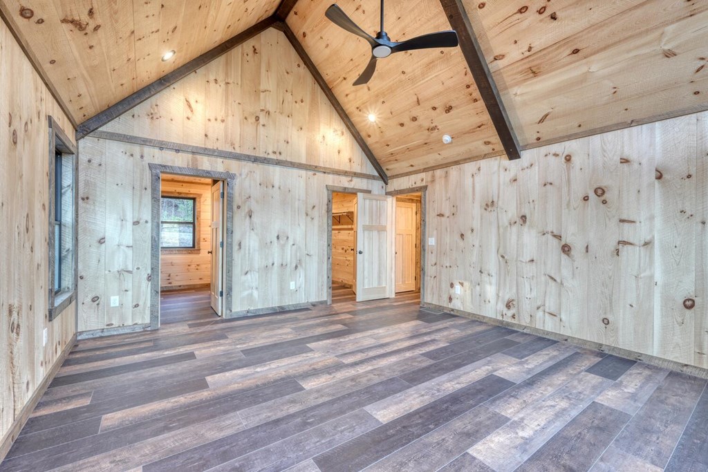 250 Wolfcreek Road Mineral Bluff, GA 30559 - Photo 43 of 59 a view of a room with wooden floor and windows