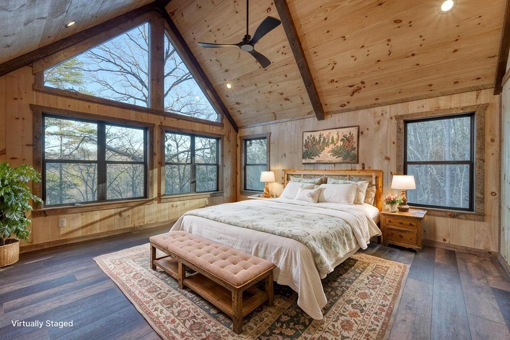 250 Wolfcreek Road Mineral Bluff, GA 30559 - Photo 6 of 59 a bed sitting in a spacious bedroom next to a window