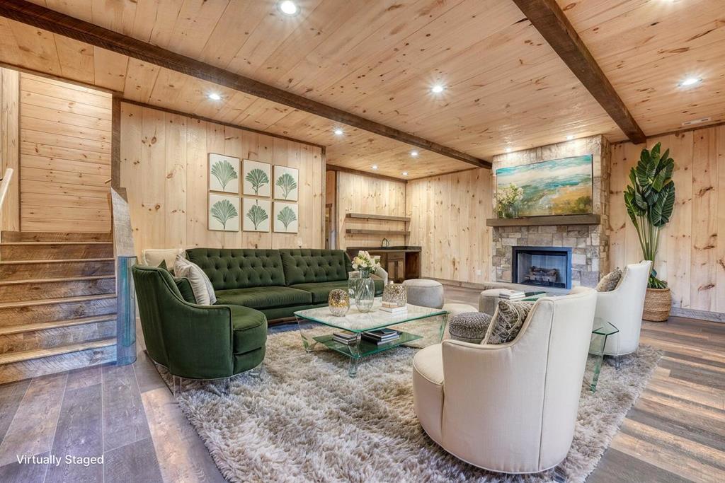 250 Wolfcreek Road Mineral Bluff, GA 30559 - Photo 8 of 59 a living room with fireplace furniture and a large window