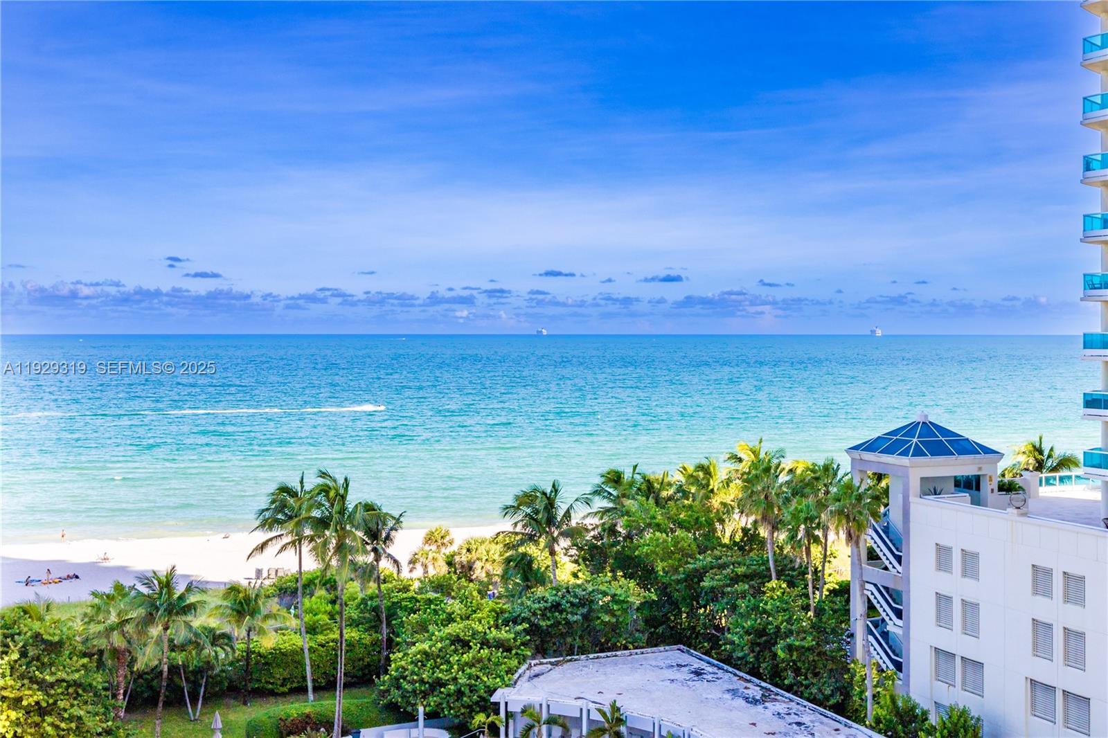 5055 Collins Avenue, Unit 10F Miami Beach, FL 33140 - Photo 16 of 24 a view of a lake with houses