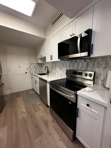 a view of a swimming pool and a yard