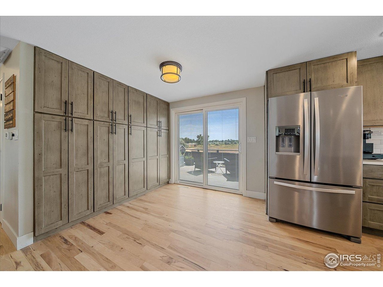 11724 Kenosha Road Longmont, CO 80504 - Photo 9 of 49 Custom pantry wall