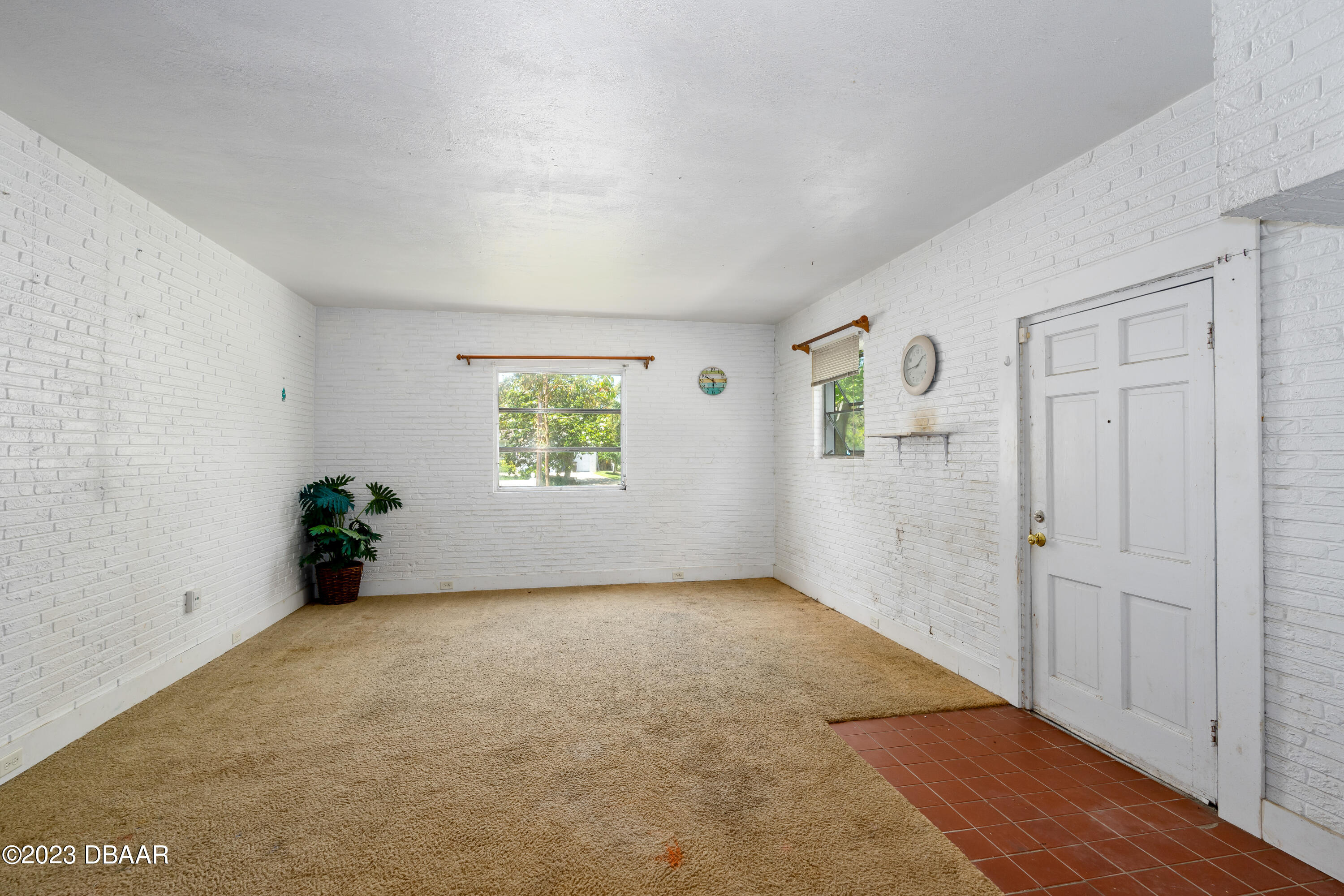 75 Seminole Avenue Ormond Beach, FL 32176 - Photo 40 of 59 an empty room with windows