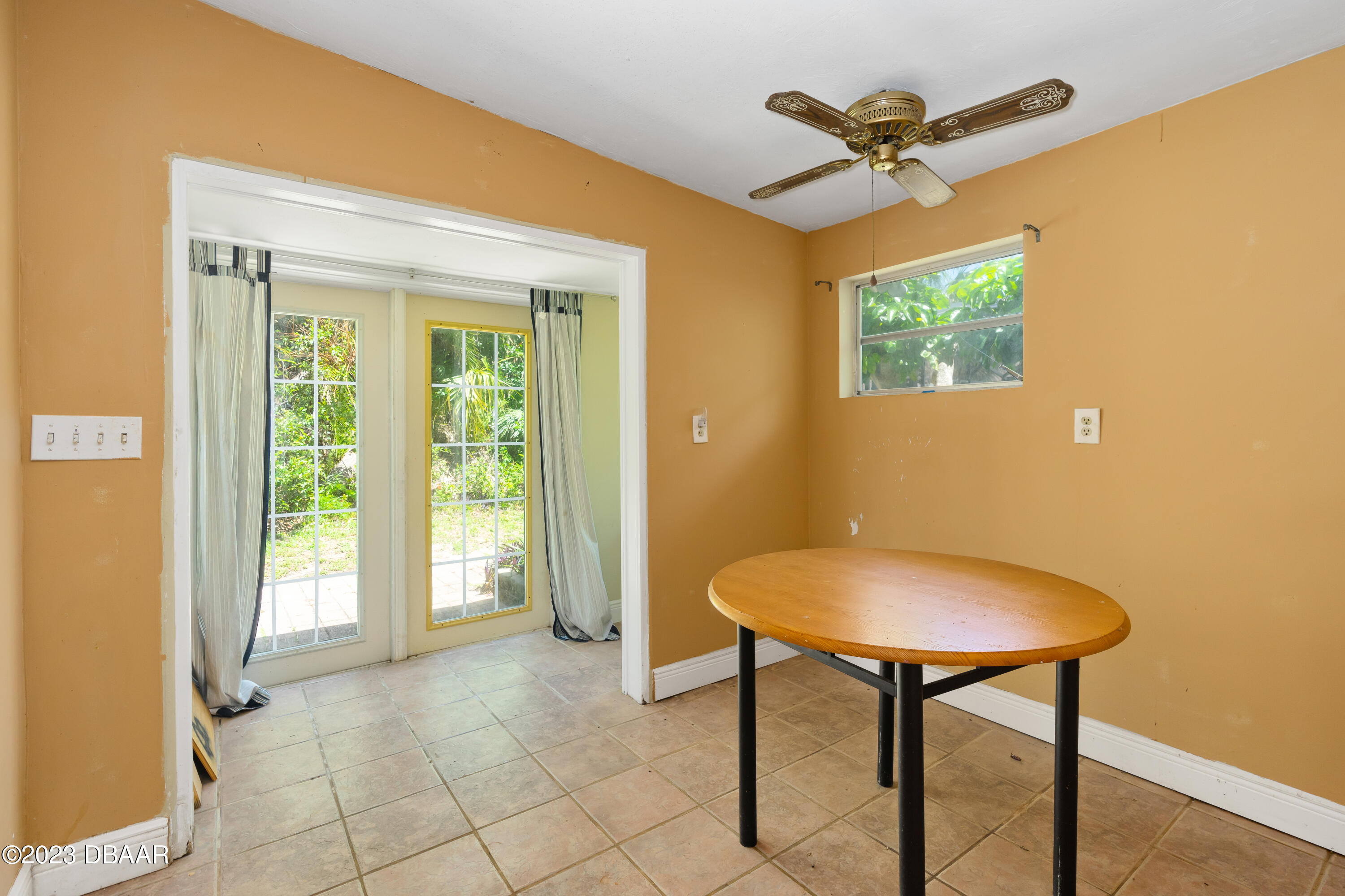 75 Seminole Avenue Ormond Beach, FL 32176 - Photo 47 of 59 a view of a livingroom with furniture and a window