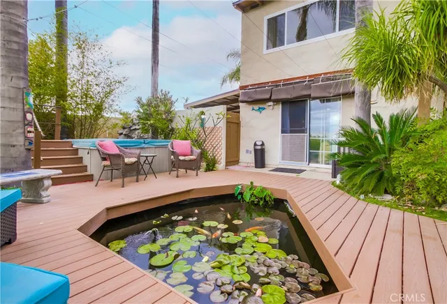 a view of a swimming pool with a patio