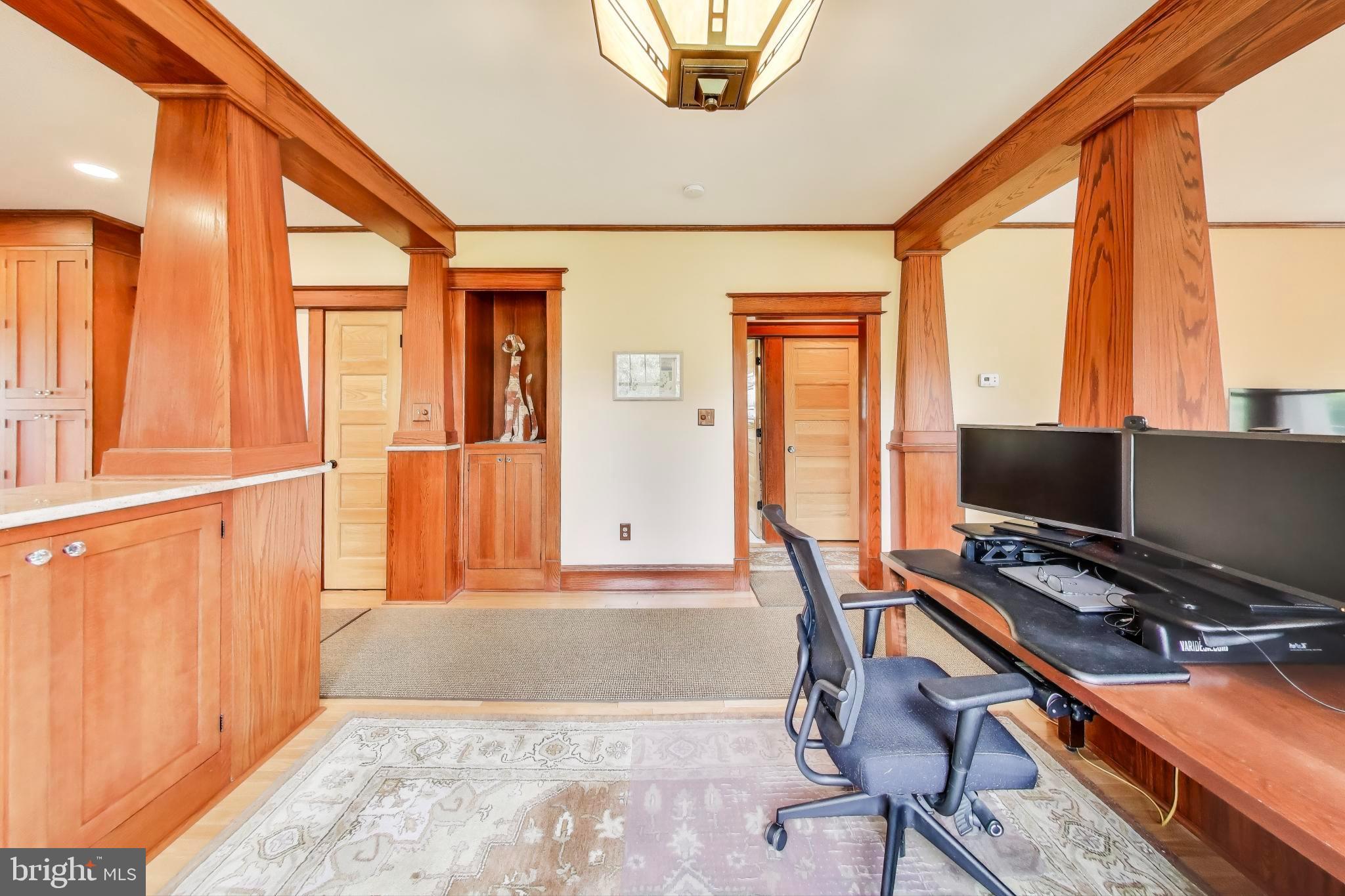 2400 Valley Way Cheverly, MD 20785 - Photo 12 of 42 Elegant workspace with rich wood accents.