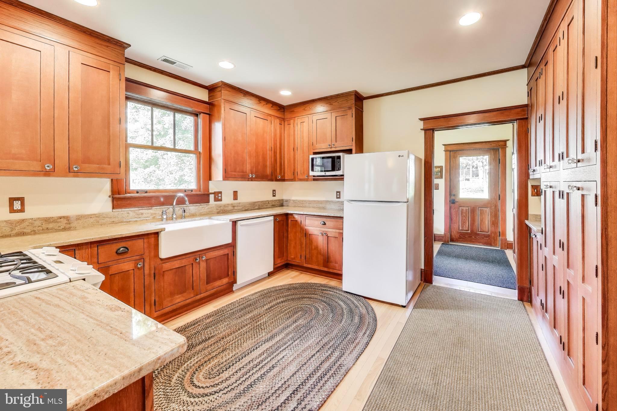 2400 Valley Way Cheverly, MD 20785 - Photo 13 of 42 Warm wood tones in a charming kitchen.