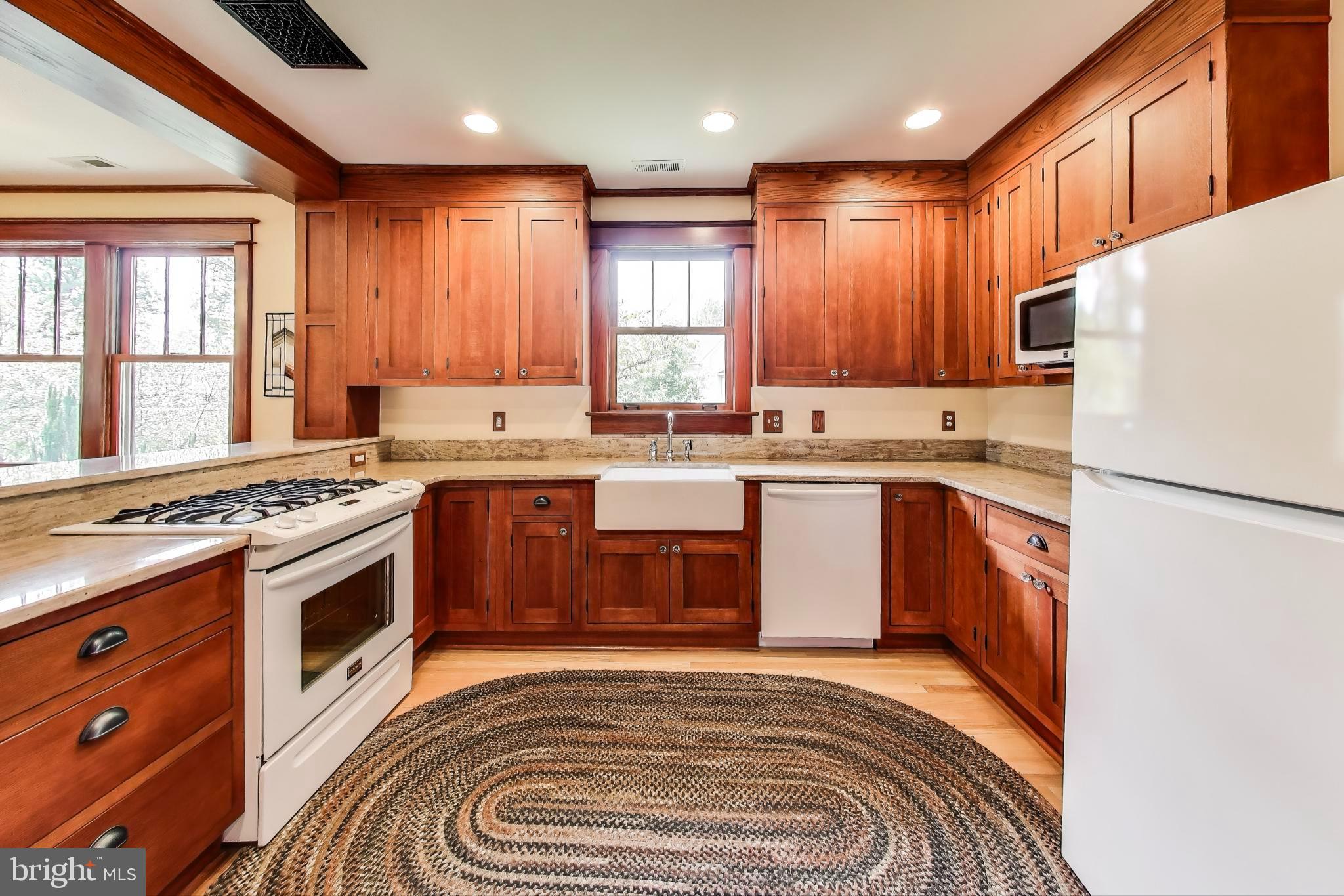 2400 Valley Way Cheverly, MD 20785 - Photo 14 of 42 Warm wood tones in a charming kitchen.