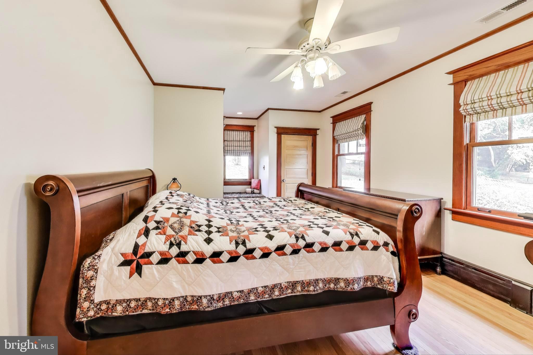 2400 Valley Way Cheverly, MD 20785 - Photo 17 of 42 Primary bedroom with classic wood accents.