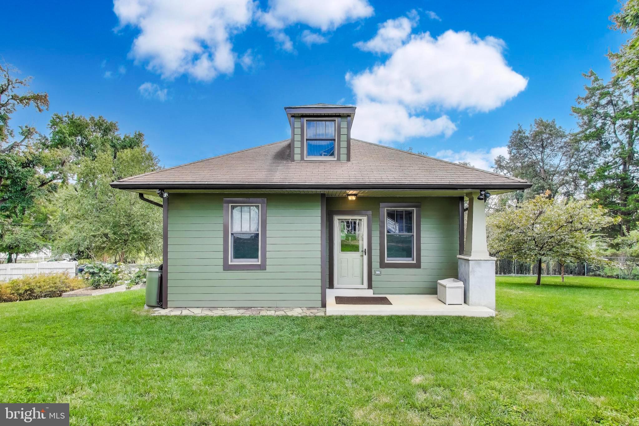 2400 Valley Way Cheverly, MD 20785 - Photo 31 of 42 Charming green cottage with inviting porch.