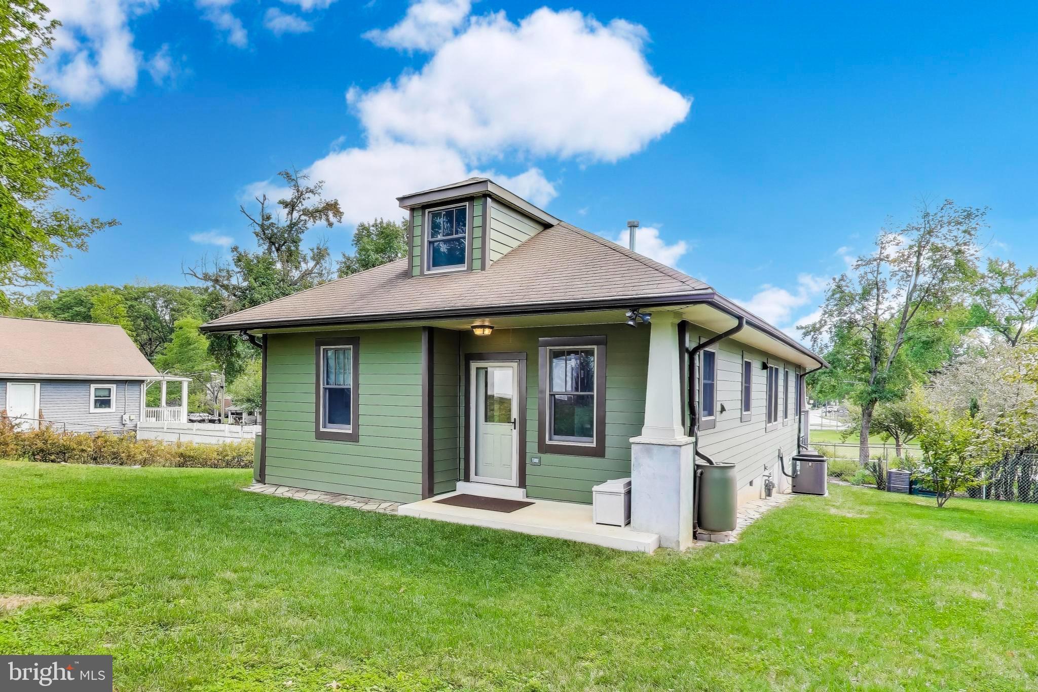 2400 Valley Way Cheverly, MD 20785 - Photo 32 of 42 Charming green cottage with inviting porch.