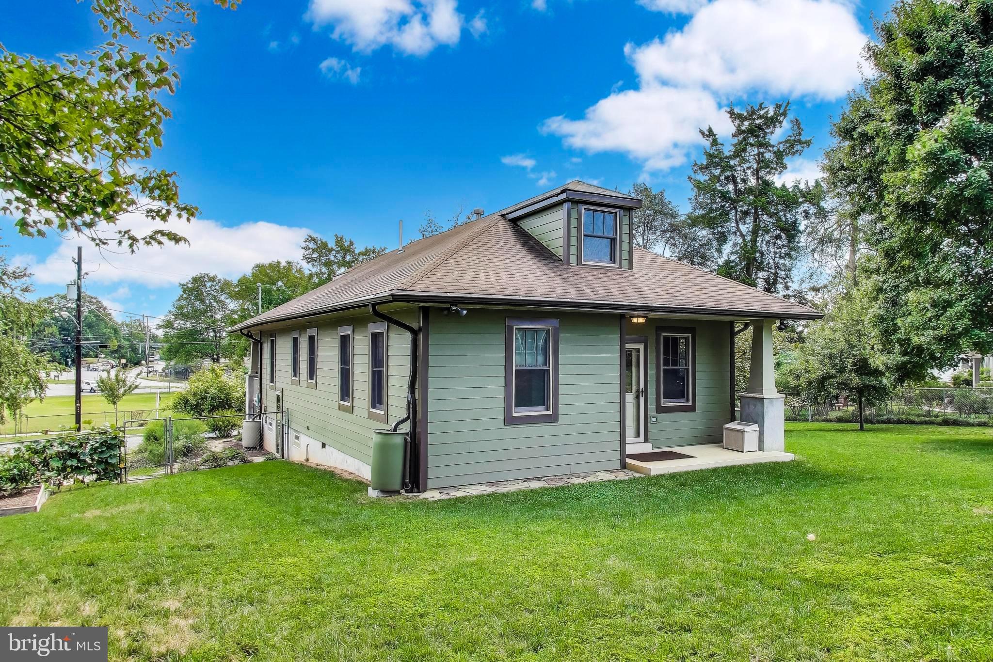 2400 Valley Way Cheverly, MD 20785 - Photo 33 of 42 Charming green cottage with inviting porch.