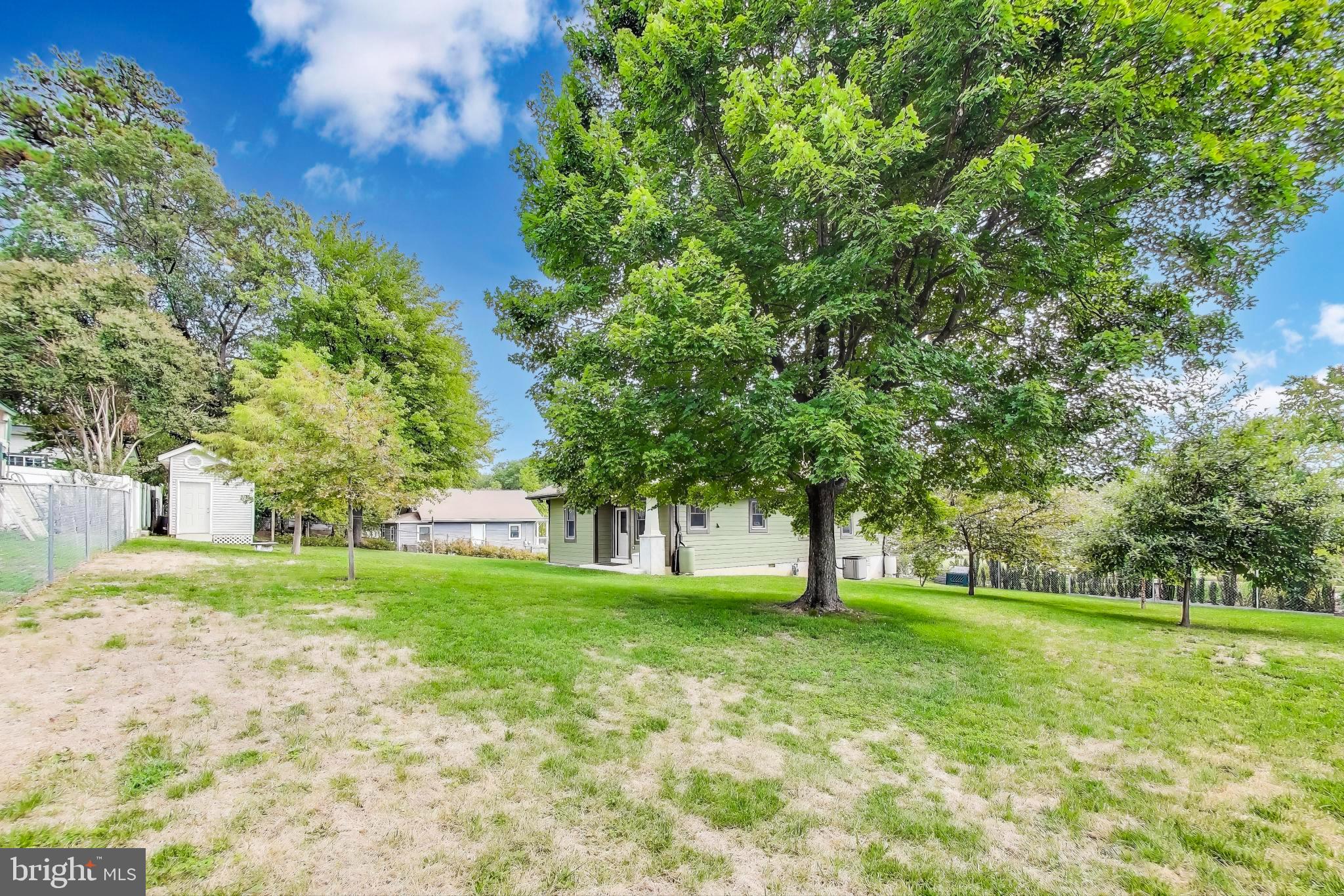 2400 Valley Way Cheverly, MD 20785 - Photo 36 of 42 Spacious yard with lush greenery and trees.
