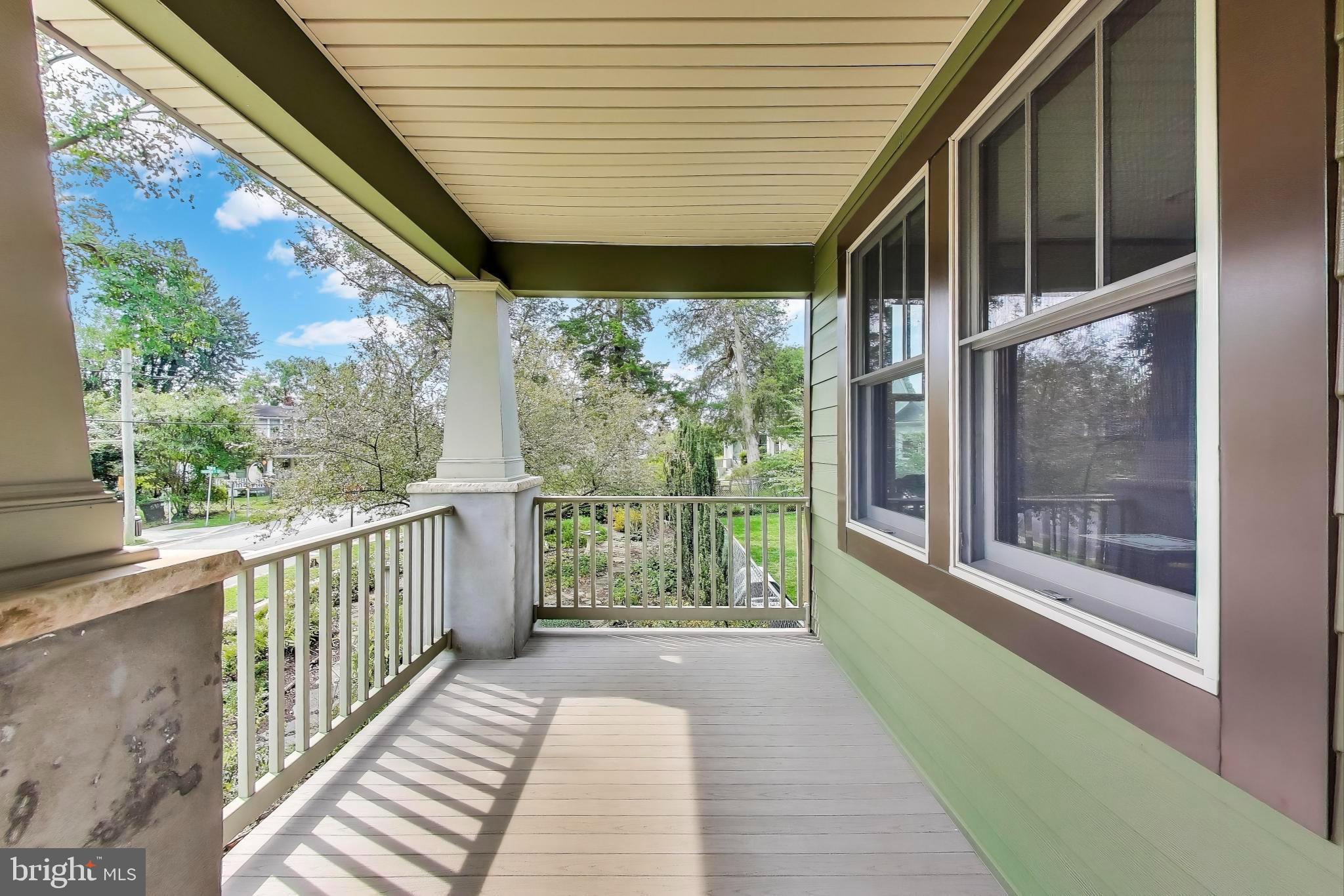 2400 Valley Way Cheverly, MD 20785 - Photo 4 of 42 Inviting porch with serene garden views.