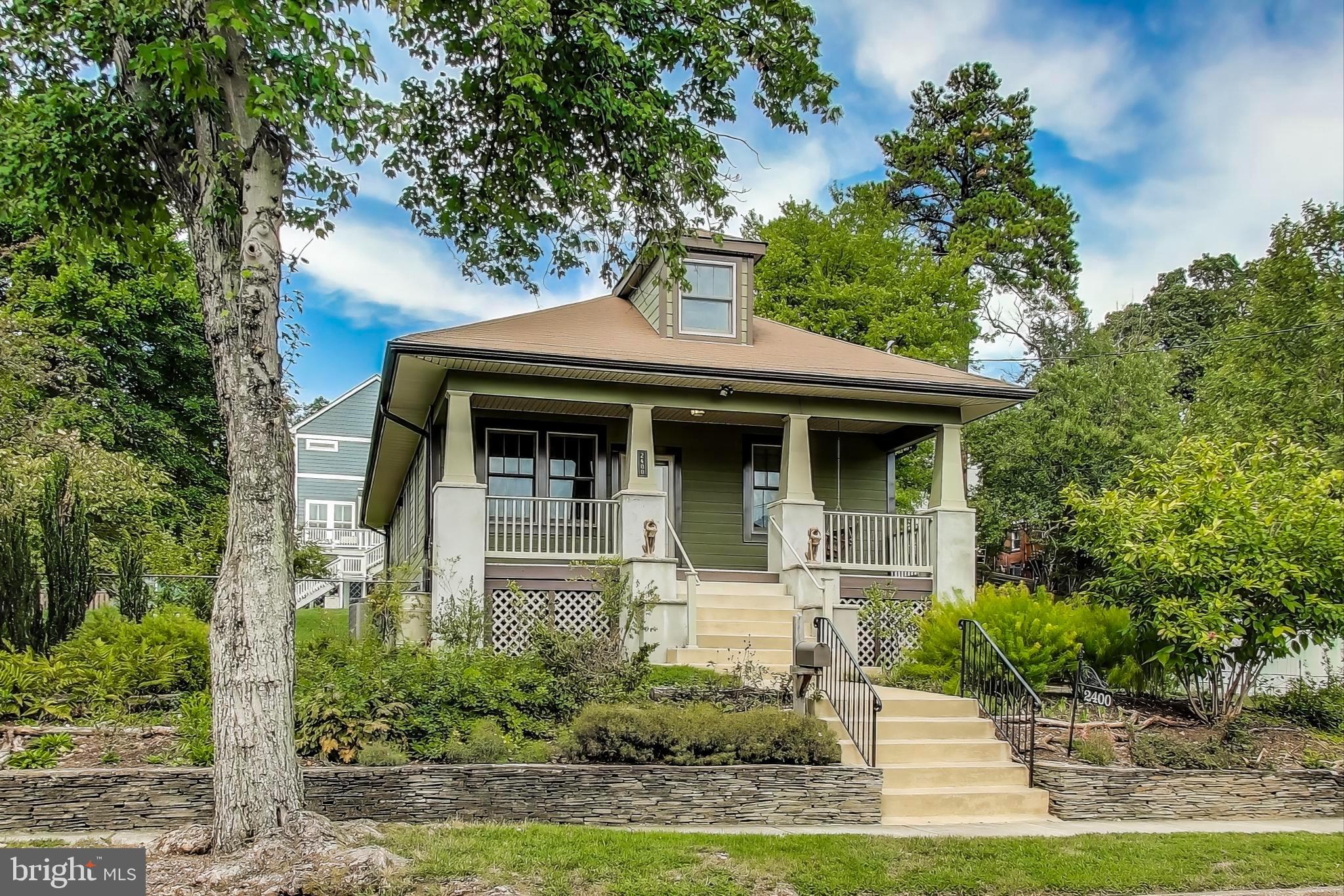 2400 Valley Way Cheverly, MD 20785 - Photo 42 of 42 Craftsman-style bungalow with lush greenery.