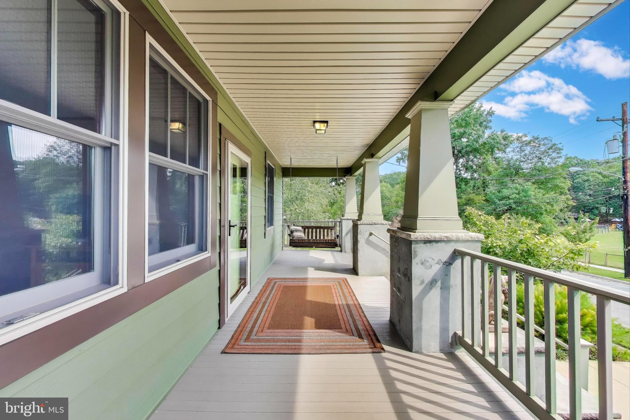 2400 Valley Way Cheverly, MD 20785 - Photo 5 of 42 Charming porch with serene outdoor views.