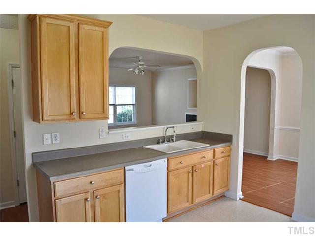 8501 Neuse Hunter Drive Raleigh, NC 27616 - Photo 8 of 16 a bathroom with a granite countertop sink and a mirror