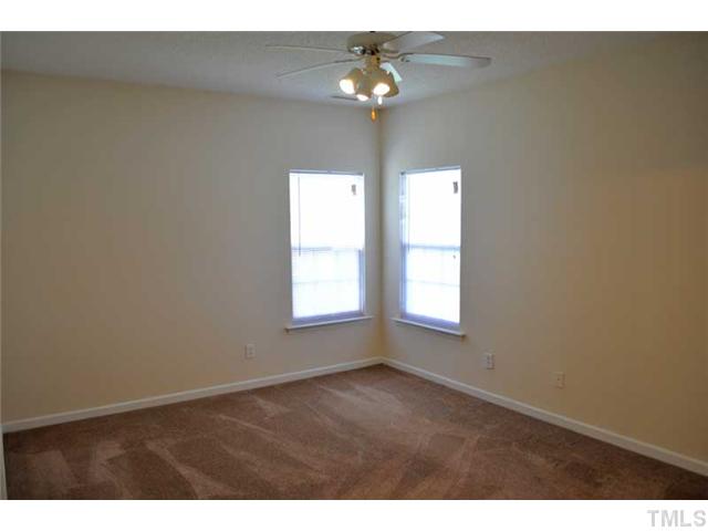 8501 Neuse Hunter Drive Raleigh, NC 27616 - Photo 9 of 16 a view of an empty room with a window