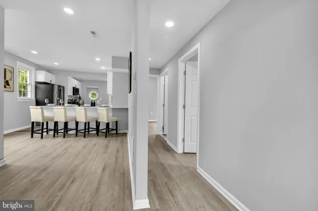 a view of a kitchen with dining area
