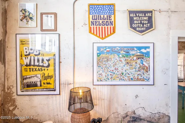 a view of a bedroom with furniture and a window