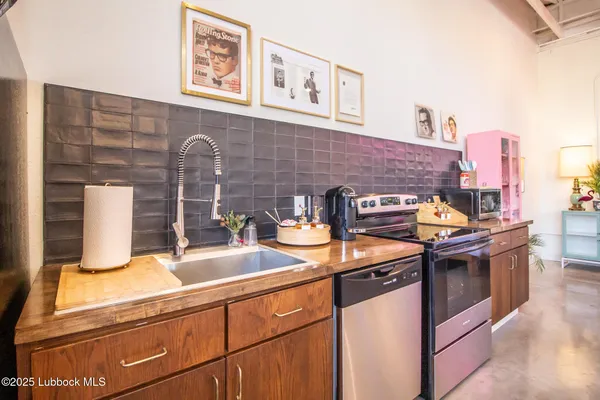 a balcony with a table and chairs