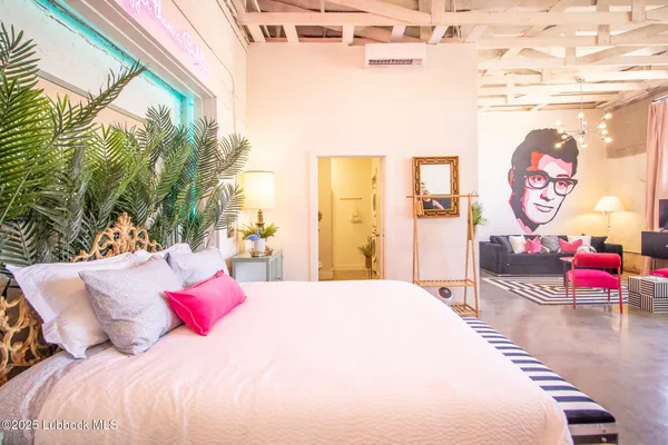 a bathroom with a double vanity sink toilet and a mirror