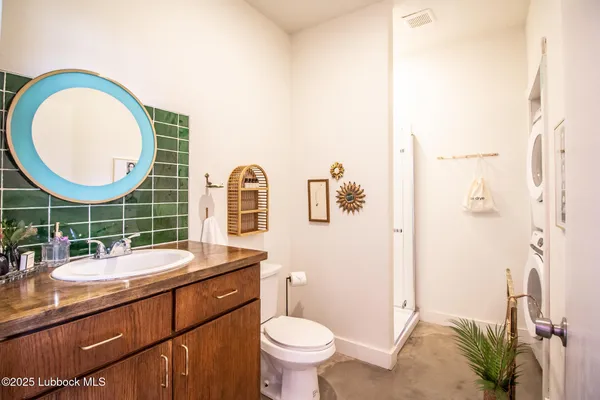 a bathroom with a shower and toilet