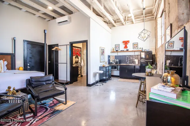 a kitchen with a table and chairs in it
