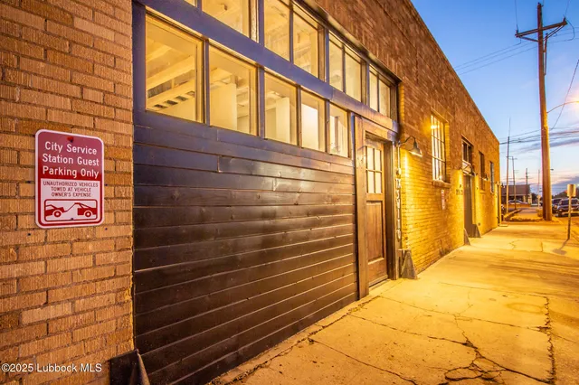 a view of a brick building with an outdoor space