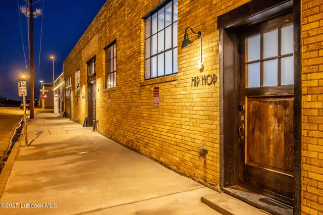 a view of a building with a street