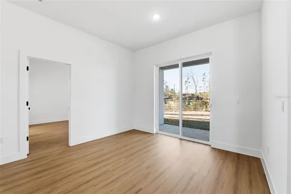 an empty room with a empty space and a window