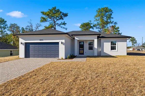 a house view with a outdoor space