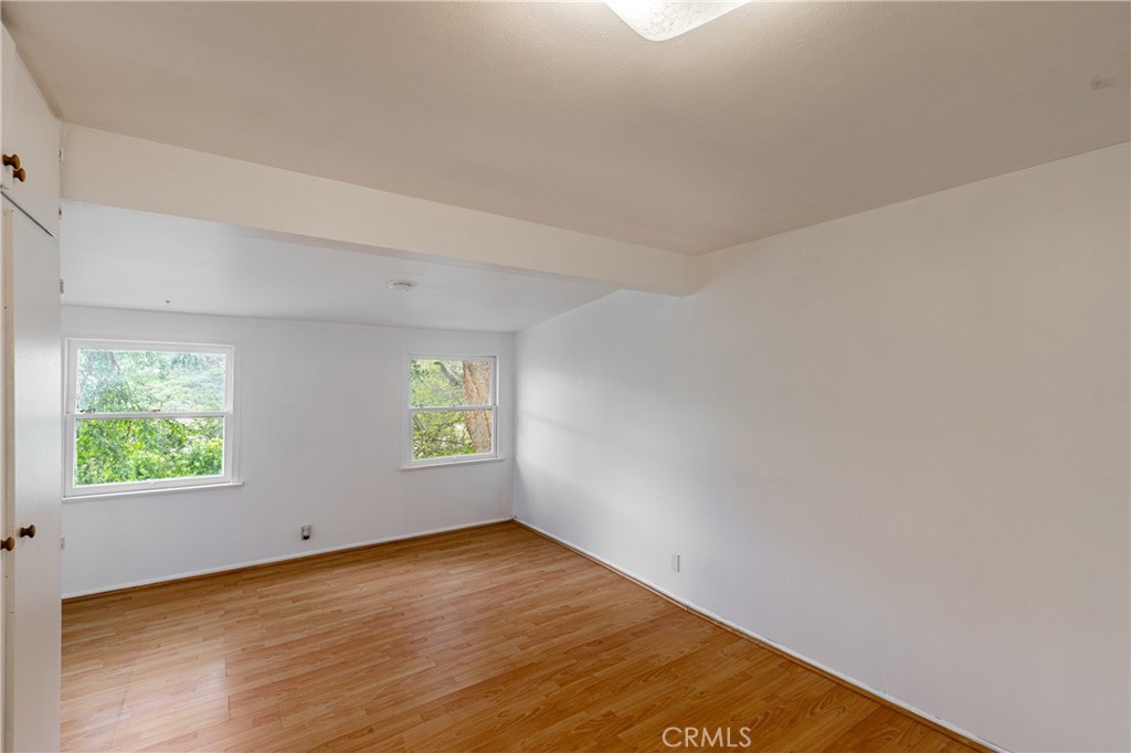 7444 Tranquil Drive Tujunga, CA 91042 - Photo 7 of 34 an empty room with windows