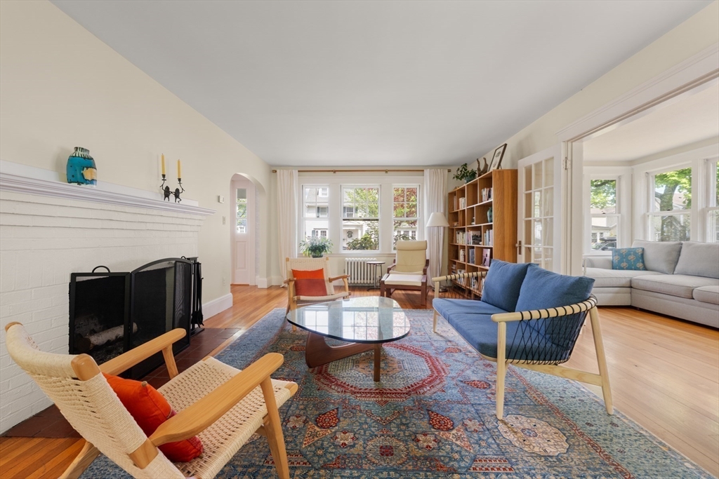 8 Charlotte Road Marblehead, MA 01945 - Photo 5 of 37 a living room with furniture and a fireplace