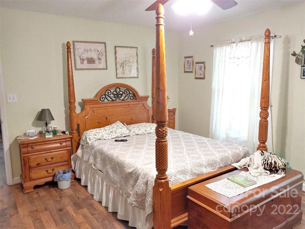 4016 Puetts Chapel Road Dallas, NC 28034 - Photo 12 of 22 a bedroom with a bed and a dresser
