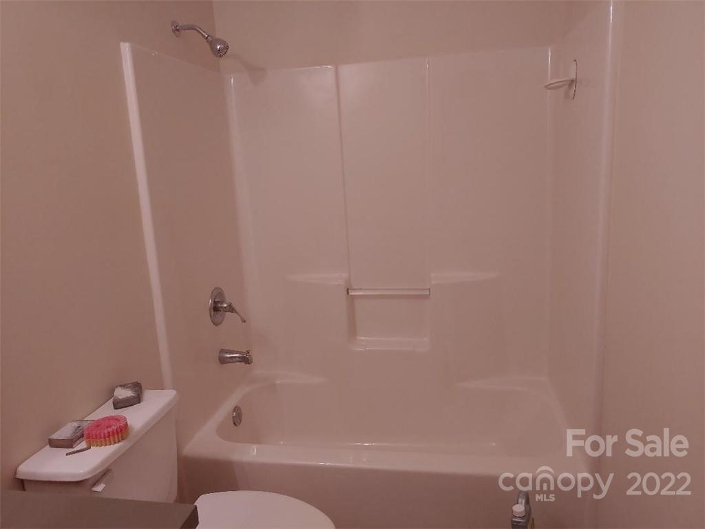 4016 Puetts Chapel Road Dallas, NC 28034 - Photo 17 of 22 a bathroom with a bathtub