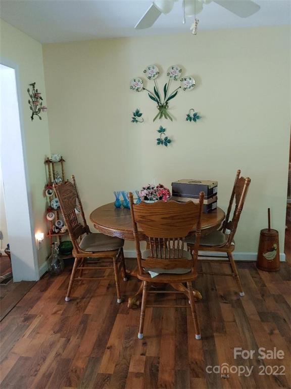4016 Puetts Chapel Road Dallas, NC 28034 - Photo 7 of 22 a dining room with furniture and wooden floor