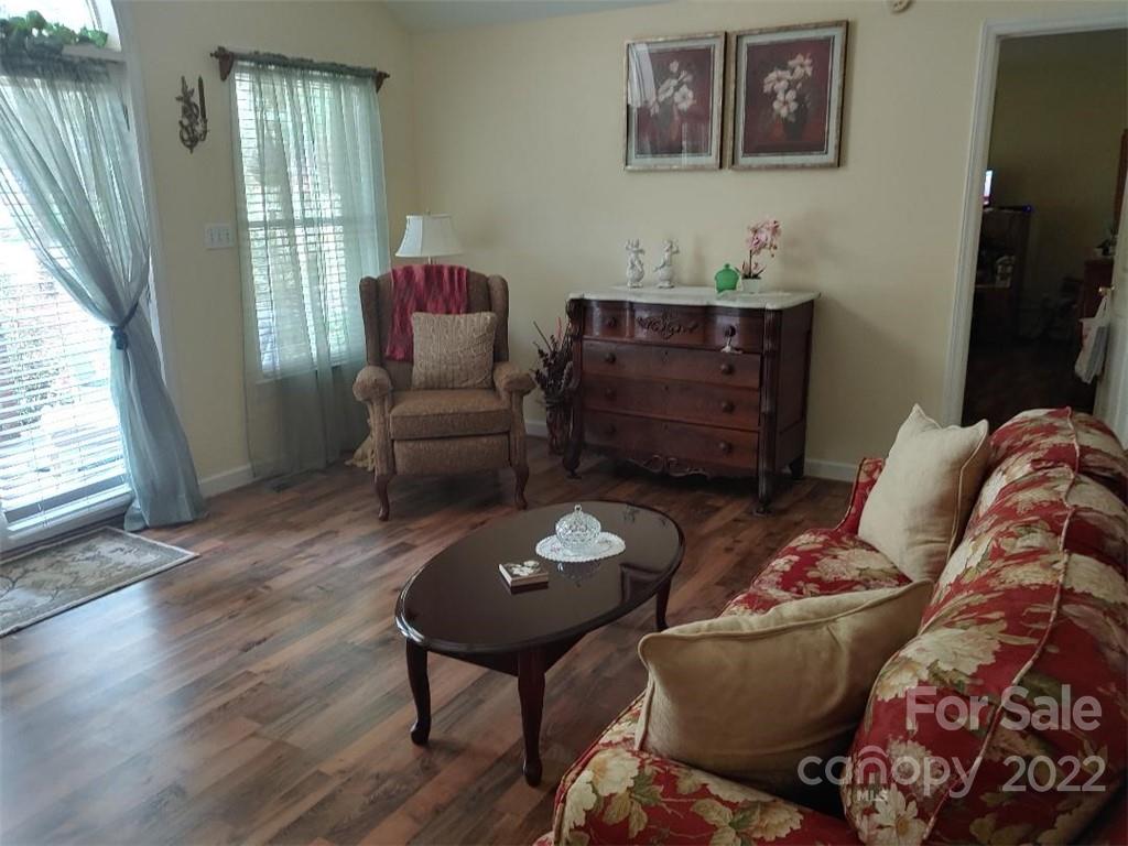 4016 Puetts Chapel Road Dallas, NC 28034 - Photo 10 of 22 a living room with furniture and a flat screen tv